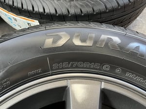 ล้อแม็ก ISUZU D-Max Patinum ขอบ 15 สีเทาดำ พร้อมยางใหม่ 215-70-15 Bridgestone ปลายปี 25