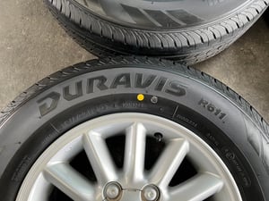 ล้อแม็ก ISUZU D-Max ขอบ 15 พร้อมยางใหม่ 215-70-15 Bridgestone ปี 25