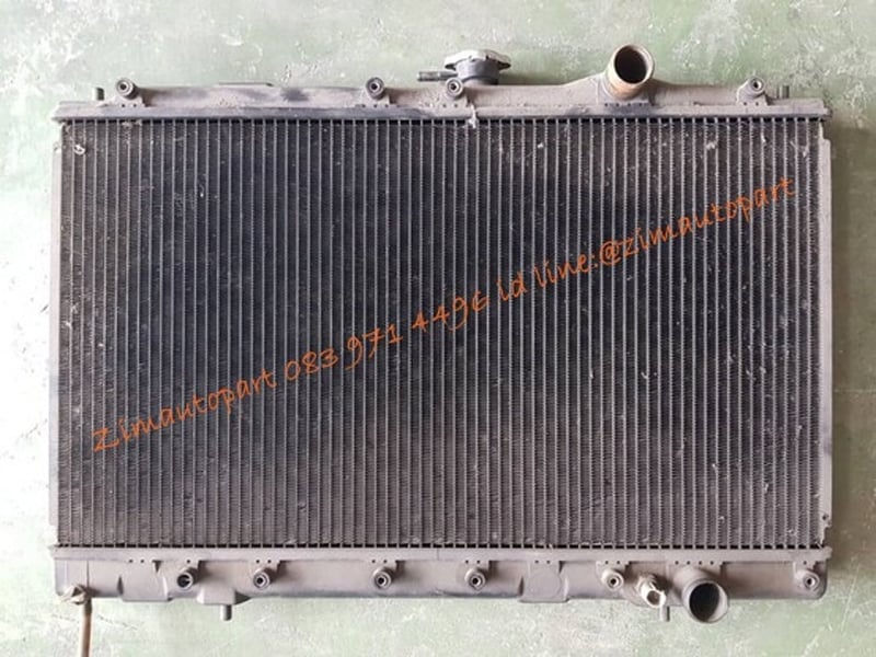 หม้อน้ำรถยนต์ mitsubishi GALAND E33A เก่าญี่ปุ่น