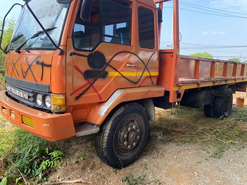 ราคา189000บาทขายรถบรรทุกมิซูบิชิ FK455 เครื่อง 6 6D14-160 แรงม้าแน่นมากๆรถปี33กระบะยาว 5 เมตร 20 กว้าง 2 เมตร 45 เอกสารมีทะเบียนพร้อมใช้งานแบตเตอรี่ไม่มีให้ครับสนใจ 091-146-4263
