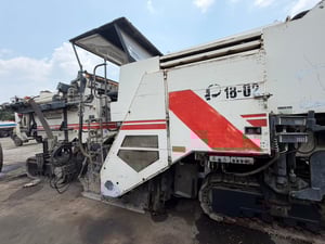 รถกัดถนน