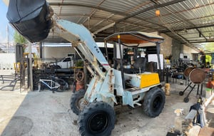 รถตักล้อยางTCM808 เอวอ่อน บุ๋งกี๋0.7Q ขับเคลื่อน4WD รถตักล้อยางTCM808 เอวอ่อน บุ๋งกี๋0.7Q ขับเคลื่อน4WD