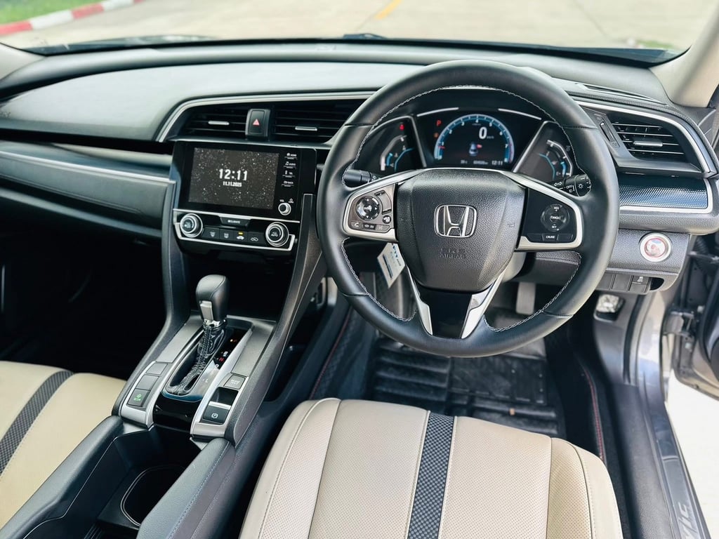 รถบ้าน สวย ราคาดี วิ่งเพียง 20,000โล ใหม่มาก วารันตีหลังการขาย  #รถคันนี้มีรายงานวาตีผลการตรวจสภาพรถ5⭐️⭐️⭐️⭐️⭐️  🔥 หล่อจัดเต็ม วิ่งน้อย เจ้าของมือเดียว แค่เห็นก็อยากเป็นเจ้าของแล้ว!  🚗 #HONDA CIVIC 1.8EL (FC) ปี2021