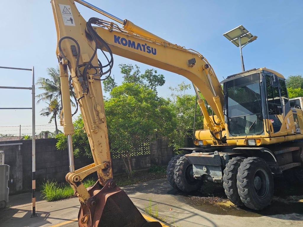 ล้อยาง PW130-7 (เก่านำเข้า)  เล่มทเบียน เครื่องปั้มเกียดี 