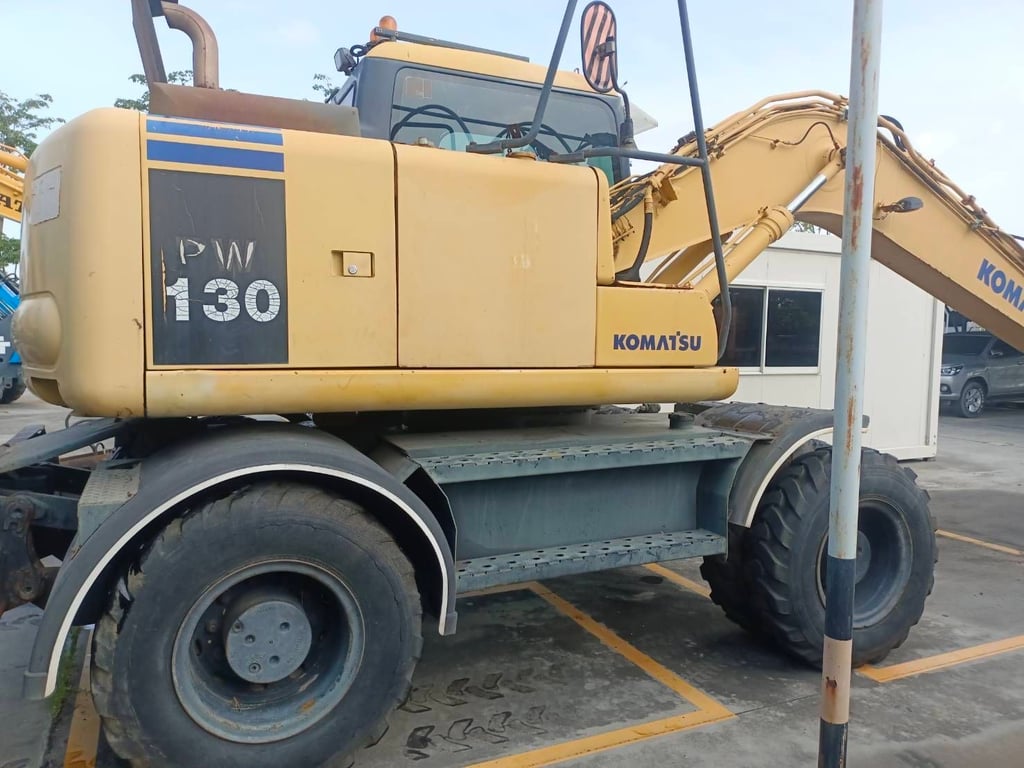 ล้อยาง PW130-7 (เก่านำเข้า)  เล่มทเบียน เครื่องปั้มเกียดี 