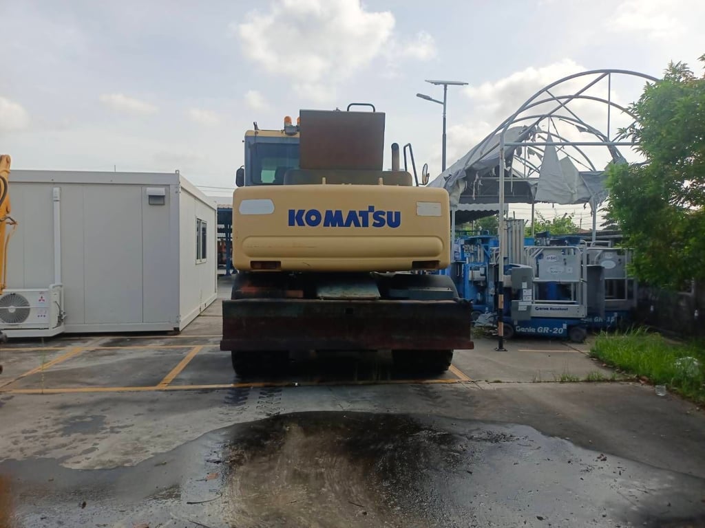 ล้อยาง PW130-7 (เก่านำเข้า)  เล่มทเบียน เครื่องปั้มเกียดี 
