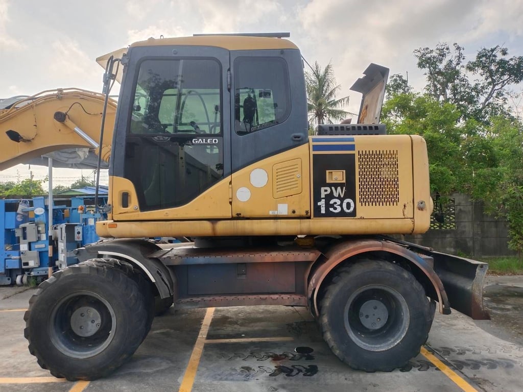 ล้อยาง PW130-7 (เก่านำเข้า)  เล่มทเบียน เครื่องปั้มเกียดี 
