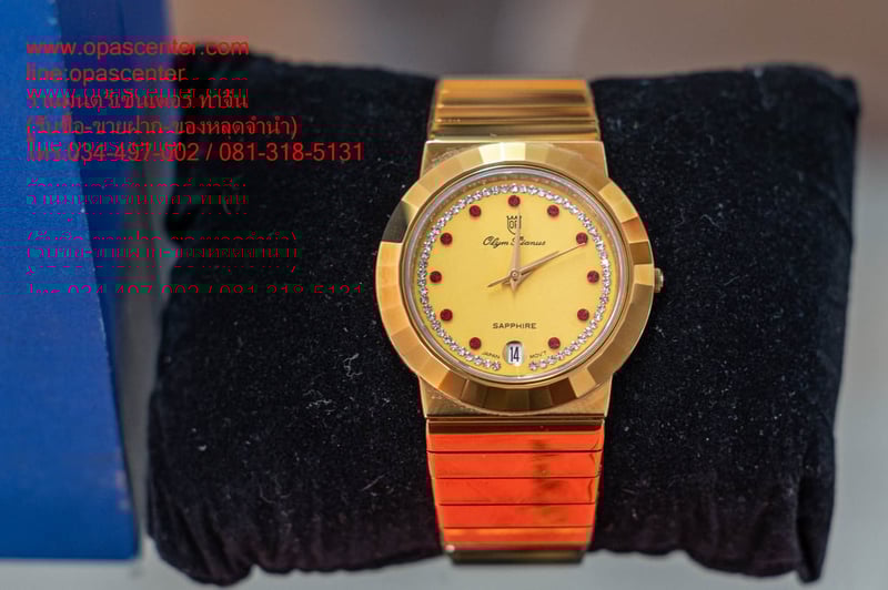 นาฬิกาข้อมือ สายสแตนเลส O.P (Olym Pianus) รุ่น 8242M-405E พลอยแดง 11 กระจก Sapphire Crystal มือสอง สภาพใหม่ มีกล่อง สายต่อ