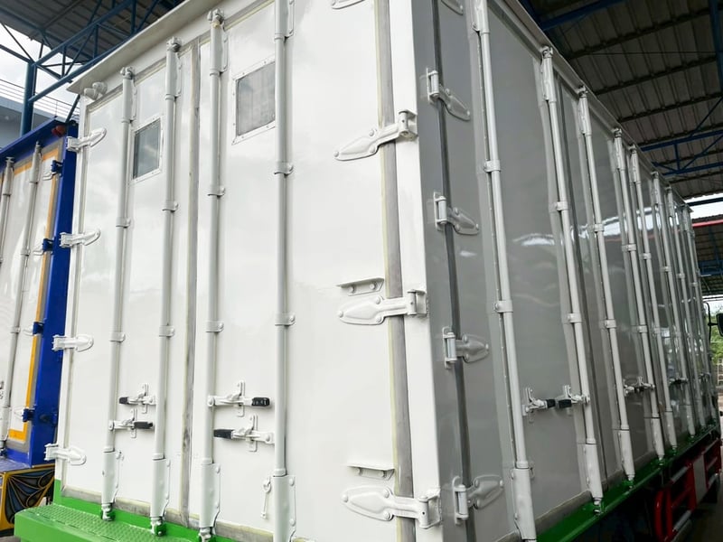 6 ล้อ ตู้บรรทุกเขียว ขาว 10 บาน  HINO FC4J 144 แรง ปี 47