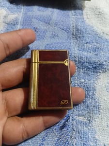 S t. Dupont made in france L2 สีทองลายเฉียง ใช้งานได้ปกติ อะไหร่ครบทุกชิ้น ขาย 7,500 บาท ครับ S t. Dupont made in france L2 สีทองลายเฉียง ใช้งานได้ปกติ อะไหร่ครบทุกชิ้น ขาย 7,500 บาท ครับ