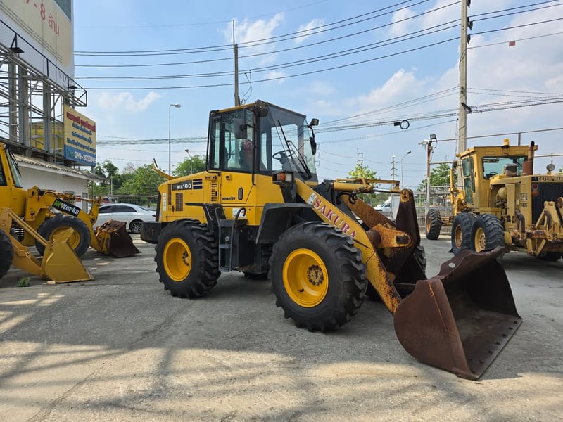 รถตักล้อยาง ยี่ห้อ KOMATSU WA100-5 ซีเรียลสูง นำเข้าจากญี่ปุ่นแท้ 100เปอร์เซ็นต์ สภาพสวย ไม่เคยใช้งานในไทย รถตักล้อยาง ยี่ห้อ KOMATSU WA100-5 ซีเรียลสูง นำเข้าจากญี่ปุ่นแท้ 100เปอร์เซ็นต์ สภาพสวย ไม่เคยใช้งานในไทย