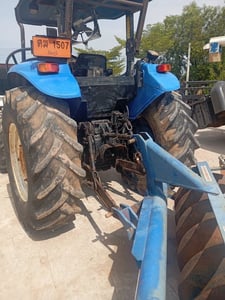 ขายรถไถNEWHOLLAND TD95D PLUS98แรงม้าปี57เป็น 2เพลามีใบดัน ผลาน7เอกสารเล่มทะเบียน  ราคา450,000฿โทร0867379991อ๊อฟ พิตร 